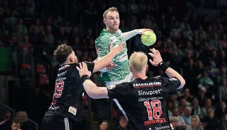 Tobias Buck, Mathias Gidsel on the ball, Sebastian Firnhaber duel Game scene Action Sport Handball HBL Bundesliga Men 25 Matchday Season 2025 2026 15 03 2026 Füchse Berlin vs HC Erlangen HCE