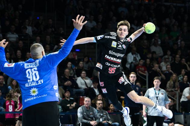 15 03 2026, xlakx, Handball Daikin HBL, Fuechse Berlin HC Erlangen v l Dejan Milosavljev Fuechse Berlin , Tim Goemmel HC Erlangen scores goal Berlin Daniel Lakomski