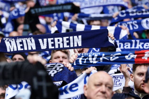 Gelsenkirchen, Germany, 15 03 26, Fans of Schalke 04 show their scarves in the air during the Bundesliga 2 match between FC Schalke 04 Hannover 96 at the Veltins Arena in Gelsenkirchen Photo by Joachim Bywaletz DFB DFL REGULATIONS PROHIBIT ANY USE OF PHOTOGRAPHS AS IMAGE SEQUENCES AND OR QUASI VIDEO Copyright: JoachimxBywaletz xJB-Sportfoto
