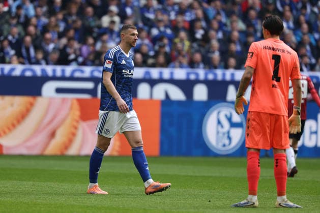 Gelsenkirchen, Germany, 15 03 26, Edin Dzeko FC Schalke 04 walks off the pitch after receiving a red card during the Bundesliga 2 match between FC Schalke 04 Hannover 96 at the Veltins Arena in Gelsenkirchen Photo by Joachim Bywaletz DFB DFL REGULATIONS PROHIBIT ANY USE OF PHOTOGRAPHS AS IMAGE SEQUENCES AND OR QUASI VIDEO Copyright: JoachimxBywaletz xJB-Sportfoto