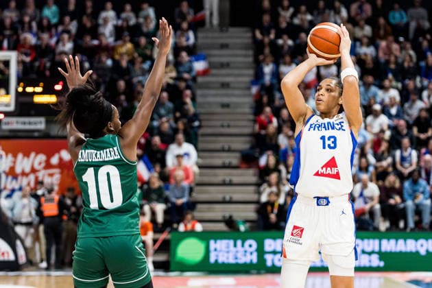 LYON-VILLEURBANNE, FRANCE - MARCH 15: Janelle Salaun (France, 13) controls the ball against Promise Amukamara (Nigeria, 10) during the FIBA Women™s World Cup Qualifying Tournament match between France (FRA) vs. Nigeria (NGR) at Astroballe on matchday 4 of the FIBA Women™s World Cup Qualifying Tournament on March 15, 2026 in Lyon-Villeurbanne, France. France Copyright: xSteffiexWunderlx