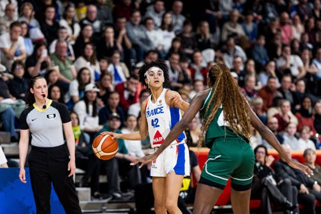 LYON-VILLEURBANNE, FRANCE - MARCH 15: Leila Lacan (France, 42) controls the ball against Victoria Macaulay (Nigeria, 25) during the FIBA Women™s World Cup Qualifying Tournament match between France (FRA) vs. Nigeria (NGR) at Astroballe on matchday 4 of the FIBA Women™s World Cup Qualifying Tournament on March 15, 2026 in Lyon-Villeurbanne, France. France Copyright: xSteffiexWunderlx