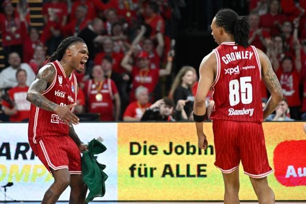 BAMBERG 15 03 2026 Basketball easycredit 1 Basketball Bundesliga 24 Matchday Bamberg Baskets vs FC Bayern Munich Basketball Cobe Williams 24, Bamberg Baskets and Austin Crowley 85, Bamberg Baskets are happy about victory Bamberg Baskets vs FC Bayern Munich Basketball