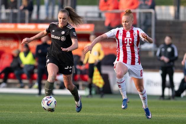 Georgia Stanway 31 FC Bayern Muenchen Frauen on the ball, attacked by Laura Vogt 8 1 FC Koeln Frauen , 1 FC Koeln Frauen vs FC Bayern Muenchen Frauen, Fußball, Google Pixel Frauen Bundesliga, 20 Spieltag, 2025 2026, 15 03 2026 DFB regulations prohibit any use of photographs as image sequences and or quasi video Koeln Nordrhein Westfalen Germany Copyright: xkolbert-press MarkusxVerwimpx