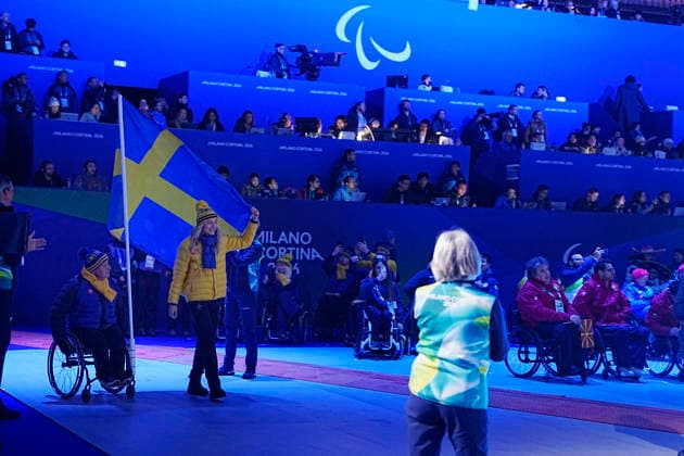 CORTINA, ITALY 20260315 Swedish flag bearers Marcus Holm and Ebba Arsjö enter during Sunday s closing ceremony for the Paralympics, in the Cortina curling stadium. *** The image is included in the SPORTS PACKAGE. For others PAYMENT IMAGE *** CORTINA ITALY x9200x *** CORTINA, ITALY 20260315 Swedish flag bearers Marcus Holm and Ebba Arsjö enter during Sunday s closing ceremony for the Paralympics, in the Cortina curling stadium The image is included in the SPORTS PACKAGE For others PAYMENT IMAGE CORTINA ITALY x9200x  Copyright: xBjörnxLarssonxRosvall TTx PARALYMPICS 2026 CONCLUSION
