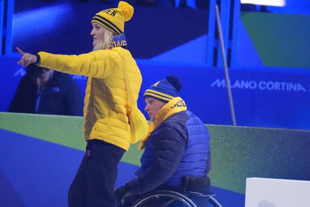 CORTINA, ITALY 20260315 Swedish flag bearers Marcus Holm and Ebba Arsjö enter during Sunday s closing ceremony for the Paralympics, in the Cortina curling stadium. *** The image is included in the SPORTS PACKAGE. For others PAYMENT IMAGE *** CORTINA ITALY x9200x *** CORTINA, ITALY 20260315 Swedish flag bearers Marcus Holm and Ebba Arsjö enter during Sunday s closing ceremony for the Paralympics, in the Cortina curling stadium The image is included in the SPORTS PACKAGE For others PAYMENT IMAGE CORTINA ITALY x9200x  Copyright: xBjörnxLarssonxRosvall TTx PARALYMPICS 2026 CONCLUSION