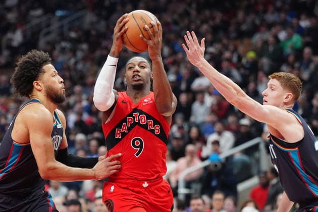 March 15, 2026, Toronto, On, Canada: Toronto Raptors forward RJ Barrett (9) controls the ball as Detroit Pistons guard Cade Cunningham, left, and Detroit Pistons guard Kevin Huerter (27) defend during first half NBA, Basketball Herren, USA basketball action in Toronto on Sunday, March 15, 2026. Canada News - March 15, 2026  - ZUMAc35_ 20260315_zaf_c35_086 Copyright: xFrankxGunnx