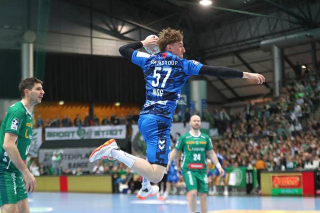 Handball DAIKIN HBL, SC DHfK Leipzig TVB Stuttgart 15 03 2026 Jakob Nigg 57, TVB Stuttgart flies to the goal throw Handball, DAIKIN HBL, 1 Bundesliga, Season 2025 2026, 25 Matchday SC DHfK Leipzig vs TVB Stuttgart on 15 03 2026 at Quarterback Immobilien Arena Leipzig Copyright: xBEAUTIFULxSPORTS JanxKaeferx
