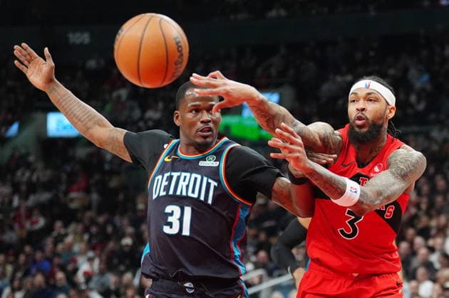 March 15, 2026, Toronto, On, Canada: Toronto Raptors forward Brandon Ingram (3) makes a pass as Detroit Pistons guard Javonte Green (31) defends during first half NBA, Basketball Herren, USA basketball action in Toronto on Sunday, March 15, 2026. Canada News - March 15, 2026  - ZUMAc35_ 20260315_zaf_c35_101 Copyright: xFrankxGunnx