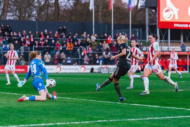 Irina Fuchs 1 FC Koeln, 34 holds a shot on goal in the penalty area from Pernille Harder FC Bayern Muenchen, 21 1 FC Köln vs FC Bayern München, Football, Google Pixel Womens Bundesliga, Matchday 20, Season 2025 26, 15 03 2026, 1 FC Köln vs FC Bayern München, Football, Google Pixel Womens Bundesliga, Matchday 20, Season 2025 26, 13 03 2026 Köln Copyright: xEibner-Pressefoto LukasxBaldygax EP_LBA