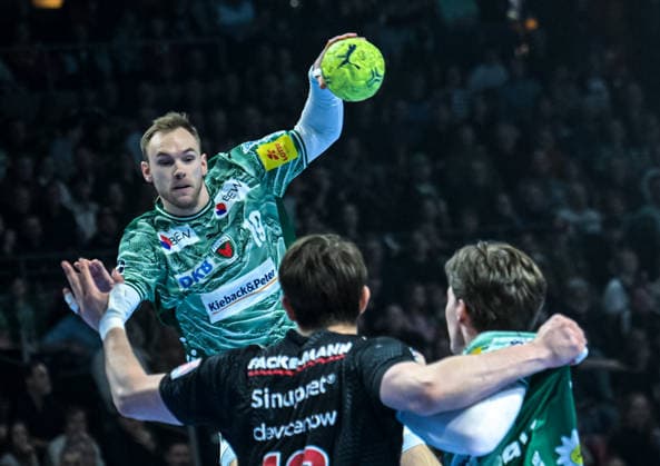 15 03 2026, xlakx, Handball Daikin HBL, Fuechse Berlin HC Erlangen f l Mathias Gidsel Fuechse Berlin , Florian Scheerer HC Erlangen , Nils Lichtlein Fuechse Berlin Berlin Daniel Lakomski