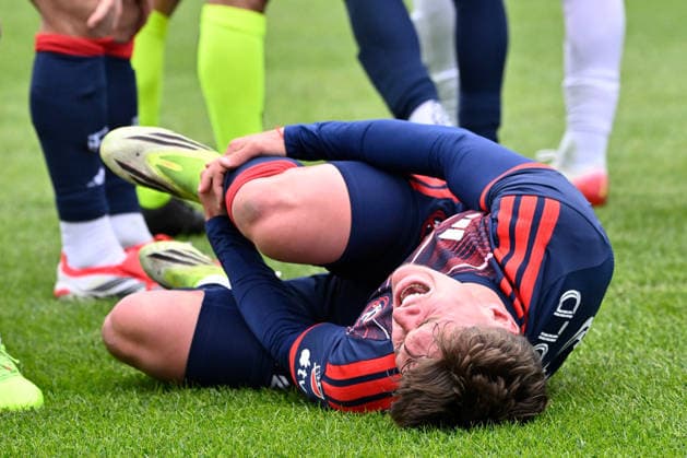 March 15, 2026; Foxborough, Massachusetts; New England Revolution defender Ilay Feingold (12) reacts after being injured during the second half against the FC Cincinnati at Gillette Stadium. CSM MLS, Fussball Herren, USA 2026: FC Cincinnati Vs Revolution MAR 15  - ZUMAc04_ 20260315_faf_c04_013 Copyright: xEricxCanhax