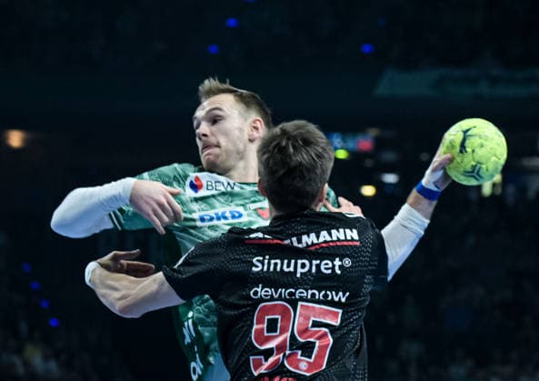 15 03 2026, xlakx, Handball Daikin HBL, Fuechse Berlin HC Erlangen f l Mathias Gidsel Fuechse Berlin , Tim Goemmel HC Erlangen goes for a jump shot Berlin Daniel Lakomski