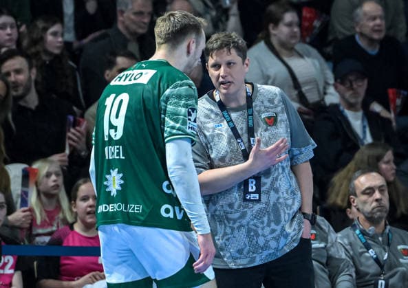 15 03 2026, xlakx, Handball Daikin HBL, Fuechse Berlin HC Erlangen v l Mathias Gidsel Fuechse Berlin , Nicolej Krickau Fuechse Berlin Trainer im Gespraech Berlin Daniel Lakomski