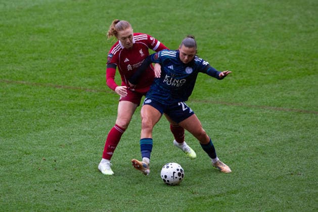 ST HELENS, ENGLAND - MARCH 15. Ceri Holland of Liverpool tackles Sarah Mayling of Leicester City at St Helens Stadium on March 15 2026 in St Helens, England. Copyright: xSeanxWalshx Sportspressphoto_SPR111064