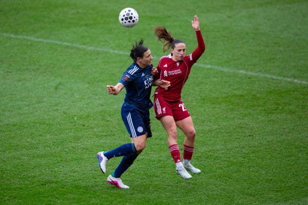 ST HELENS, ENGLAND - MARCH 15. Rachel Williams of Leicester City and Alejandra Bernabe of Liverpool battle for the ball in the air at St Helens Stadium on March 15 2026 in St Helens, England. Copyright: xSeanxWalshx Sportspressphoto_SPR111075