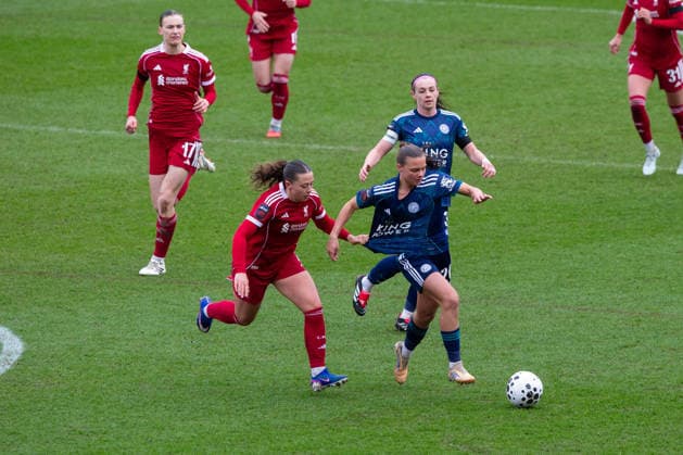 ST HELENS, ENGLAND - MARCH 15. Cornelia Kapocs of Liverpool fouls Sarah Mayling of Leicester City at St Helens Stadium on March 15 2026 in St Helens, England. Copyright: xSeanxWalshx Sportspressphoto_SPR111122