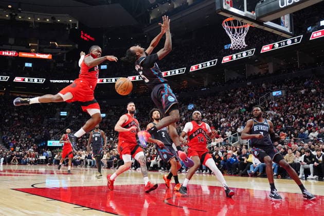 March 15, 2026, Toronto, On, Canada: Toronto Raptors forward Jonathan Mogbo (2) and Detroit Pistons forward Ronald Holland II (5) battle for a rebound during second half NBA, Basketball Herren, USA basketball action in Toronto on Sunday, March 15, 2026. Canada News - March 15, 2026  - ZUMAc35_ 20260315_zaf_c35_128 Copyright: xFrankxGunnx