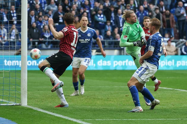 2 Bundesliga FC Schalke 04 Hannover 96 on 15 03 2026 at the Veltins Arena in Schalke Benedikt Pichler Hannover scores against goalkeeper Loris Karius Schalke 1 to make it 2 - 2 MH