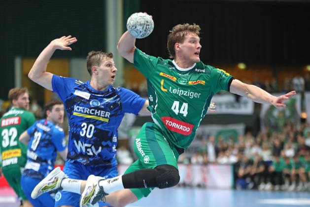 Handball DAIKIN HBL, SC DHfK Leipzig TVB Stuttgart 15 03 2026 Blaer Hinriksson 44, SC DHfK Leipzig escapes Marco Mengon 30, TVB Stuttgart Handball, DAIKIN HBL, 1 Bundesliga, Season 2025 2026, 25 Matchday SC DHfK Leipzig vs TVB Stuttgart on 15 03 2026 at Quarterback Immobilien Arena Leipzig Copyright: xBEAUTIFULxSPORTS JanxKaeferx