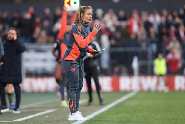 Co coach Clara Schöne FC Bayern Munich gestures during the Woman Bundesliga match between 1 FC Köln and Bayern Munich at Franz Kremer Stadion on March 15, 2026 in Cologne, Germany, Germany Photo by Oliver Kaelke DeFodi Images Co coach Clara Schöne FC Bayern München gestures during the Woman Bundesliga match between 1 FC Köln and Bayern München at Franz Kremer Stadion on March 15, 2026 in Cologne, Germany Photo by Oliver Kaelke DeFodi Images DFL regulations prohibit any use of photographs as image sequences and or quasi video Photo by Oliver Kaelke DeFodi Images