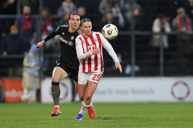 Vanessa Gilles FC Bayern München and Laura Donhauser 1 FC Köln in a duel during the Woman Bundesliga match between 1 FC Köln and Bayern München, Franz Kremer Stadion on March 15 in Cologne, Germany Photo by Oliver Kaelke DeFodi Images Vanessa Gilles FC Bayern München and Laura Donhauser 1 FC Köln battle for the ball during the Woman Bundesliga match between 1 FC Köln and Bayern München at Franz Kremer Stadion on March 15, 2026 in Cologne, Germany Photo by Oliver Kaelke DeFodi Images DFL regulations prohibit any use of photographs as image sequences and or quasi video Photo by Oliver Kaelke DeFodi Images