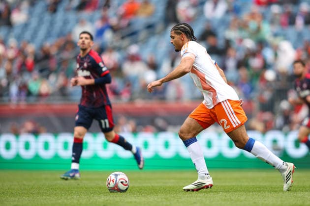 March 15, 2026; Foxborough, Massachusetts, USA; FC Cincinnati defender Miles Robinson (12) dribbles the ball upfield in a Major League Soccer game between the New England Revolution and FC Cincinnati at Gillette Stadium. (c) CSM - ZUMAc04_ 20260315_zma_c04_016 Copyright: xBurtxGranofskyx