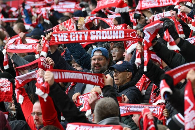 Nottingham Forest v Fulham - Premier League Forest supporters hold up scarves during the Premier League match between Nottingham Forest and Fulham at the City Ground in Nottingham, United Kingdom, on March 15, 2026. Nottingham Nottinghamshire United Kingdom  Copyright: xMIxNewsx originalFilename:fletcher-nottingh260315_npYgt.jpg
