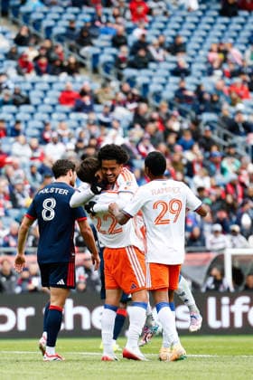 March 15, 2026; Foxborough, Massachusetts, USA; FC Cincinnati midfielder Gerardo Valenzuela (22) and FC Cincinnati forward Evander (10) embrace after an early goal in a Major League Soccer game between the New England Revolution and FC Cincinnati at Gillette Stadium. (c) CSM - ZUMAc04_ 20260315_zma_c04_030 Copyright: xBurtxGranofskyx