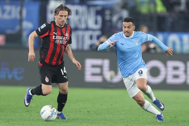 CALCIO - Serie A - SS Lazio vs AC Milan Rome, Italy - March 15, 2026: Luka Modric (midfielder) of AC Milan fight for the ball with Pedro Rodriguez (winger) of SS Lazio seen in action during the Serie A Enilive 2025-2026 football match between S.S. Lazio vs A.C. Milan at Olympic Stadium. Rome Italy  Copyright: xIPAxSport ABACAx