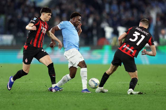 CALCIO - Serie A - SS Lazio vs AC Milan Rome, Italy - March 15, 2026: Davide Bartesaghi (defender) of AC Milan, Fisayo Dele-Bashiru (central midfielder) of SS Lazio , Strahinja Pavlovic (defender) of AC Milan seen in action during the Serie A Enilive 2025-2026 football match between S.S. Lazio vs A.C. Milan at Olympic Stadium. Rome Italy  Copyright: xIPAxSport ABACAx