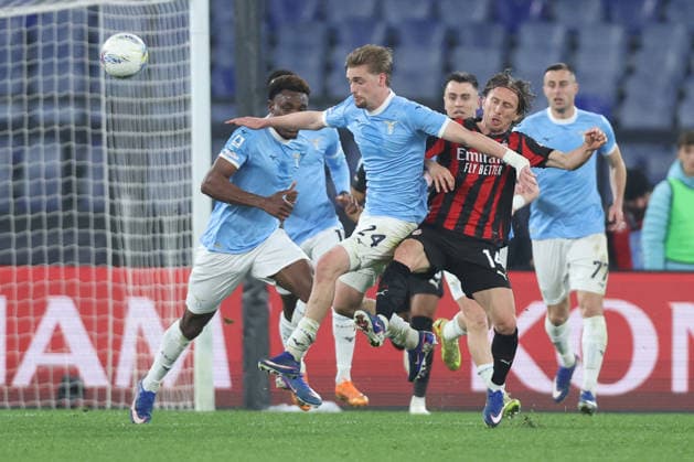 CALCIO - Serie A - SS Lazio vs AC Milan Rome, Italy - March 15, 2026: Kenneth Taylor (central midfielder) of SS Lazio, Luka Modric (midfielder) of AC Milan seen in action during the Serie A Enilive 2025-2026 football match between S.S. Lazio vs A.C. Milan at Olympic Stadium. Rome Italy  Copyright: xIPAxSport ABACAx