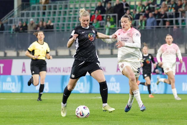 15 03 2026, xgrfx, Soccer Google Pixel Women Bundesliga, VfL Wolfsburg Bayer Leverkusen v l Alexandra Popp VfL Wolfsburg , Carlotta Wamser Bayer Leverkusen DFL DFB REGULATIONS PROHIBIT ANY USE OF PHOTOGRAPHS as IMAGE SEQUENCES and or QUASI VIDEO Wolfsburg