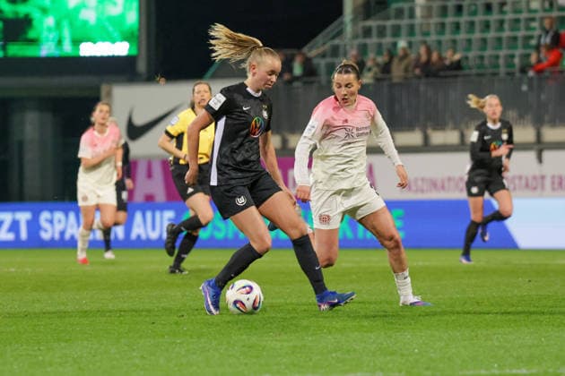 15 03 2026, xgrfx, Soccer Google Pixel Women Bundesliga, VfL Wolfsburg Bayer Leverkusen v l Ella Peddemors VfL Wolfsburg , Carlotta Wamser Bayer Leverkusen DFL DFB REGULATIONS PROHIBIT ANY USE OF PHOTOGRAPHS as IMAGE SEQUENCES and or QUASI VIDEO Wolfsburg