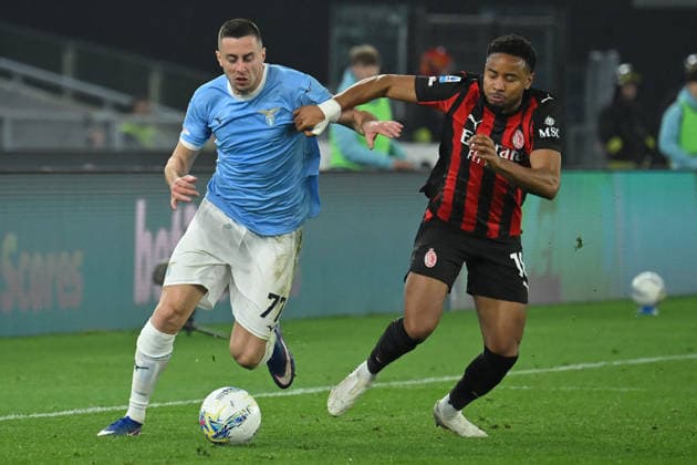 CALCIO - Serie A - SS Lazio vs AC Milan Adam Marusic of SS Lazio,Christopher Nkunku of AC Milan during the serie A Enilive match between SS Lazio v AC Milan at olimpico stadium in Rome, March 14th, 2026 Mattia Vian Rome Italy  Copyright: xIPAxSport ABACAx