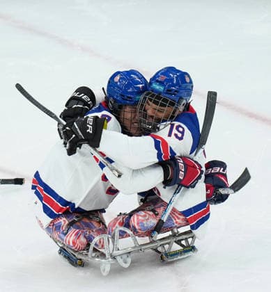 (260316) -- MILAN, March 16, 2026 -- Kayden Beasley (L) and Malik Jones of the United States celebrate a goal during the Para Ice hockey, Eishockey final match between the United States and Canada at the Milan-Cortina 2026 Paralympic Winter games, Winterspiele,Spiele, Summer games in Milan, Italy, March 15, 2026. ) (SP)ITALY-MILAN-CORTINA 2026-PARALYMPIC WINTER GAMES-PARA ICE HOCKEY-USA VS CANADA LixJing 