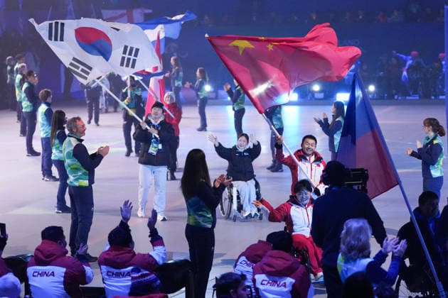 (260316) -- CORTINA D AMPEZZO, March 16, 2026 -- Flagbearers Cai Jiayun and Wang Meng of the delegation of China parade during the closing ceremony of Milan-Cortina 2026 Paralympic Winter games, Winterspiele,Spiele, Summer games in Cortina D ampezzo, Italy, March 15, 2026. ) (SP)ITALY-CORTINA D AMPEZZO-PARALYMPIC WINTER GAMES-CLOSING CEREMONY LianxYi 