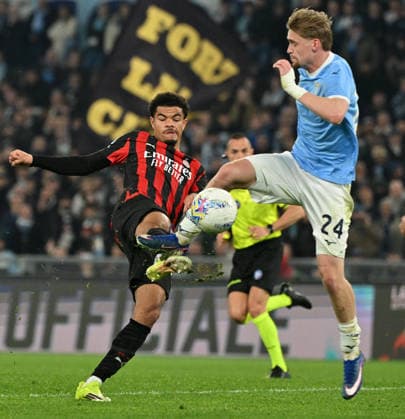 (260316) -- ROME, March 16, 2026 -- Lazio s Kenneth Taylor (R) vies with AC Milan s Zachary Athekame during a Serie A football match between Lazio and AC Milan in Rome, Italy, March 15, 2026. (Photo by Alberto Lingria Xinhua) (SP)ITALY-ROME-FOOTBALL-SERIE A-LAZIO VS AC MILAN LixJing 