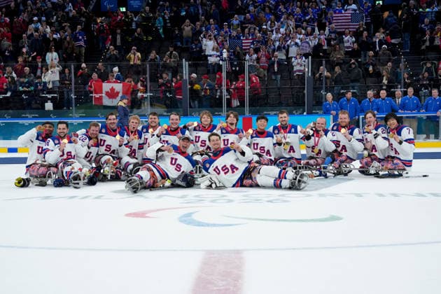 (260316) -- MILAN, March 16, 2026 -- Gold medalists Team USA pose on the awarding ceremony after the Para Ice hockey, Eishockey final match between the United States and Canada at the Milan-Cortina 2026 Paralympic Winter games, Winterspiele,Spiele, Summer games in Milan, Italy, March 15, 2026. ) (SP)ITALY-MILAN-CORTINA 2026-PARALYMPIC WINTER GAMES-PARA ICE HOCKEY-USA VS CANADA LixJing 
