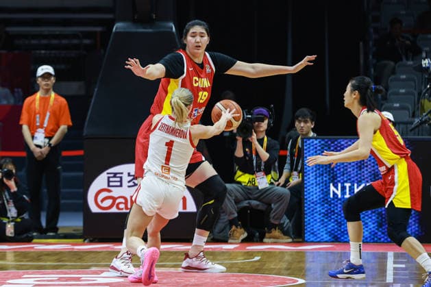 WUHAN, CHINA - MARCH 15: Zhang Ziyu 19 of China tries to block the ball during the FIBA Women s Basketball World Cup 2026 Qualifying Tournaments between the Czech Republic and China at Wuhan Sports Centre on March 15, 2026 in Wuhan, Hubei Province of China.  Copyright: xVCGx 111628358902