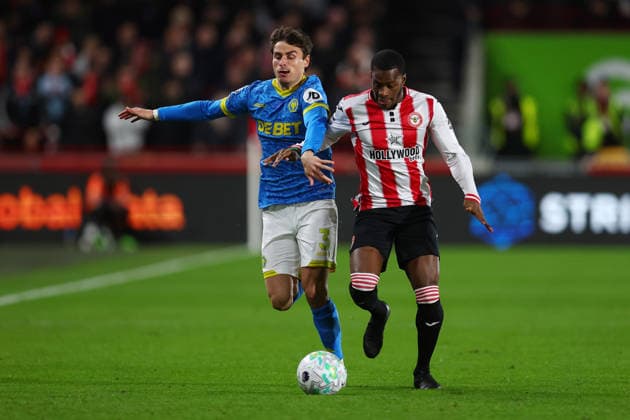 London, England, 16th March 2026. Hugo Bueno of Wolverhampton Wanderers and Dango Ouattara of Brentford challenge for the ball during the Brentford vs Wolverhampton Wanderers Premier League match at Gtech Community Stadium, London. Picture credit should read: Paul Terry Sportimage EDITORIAL USE ONLY. No use with unauthorised audio, video, data, fixture lists, club league logos or live services. Online in-match use limited to 120 images, no video emulation. No use in betting, games or single club league player publications. SPI_009_PT_Brentford_Wolves SPI-4606-0009