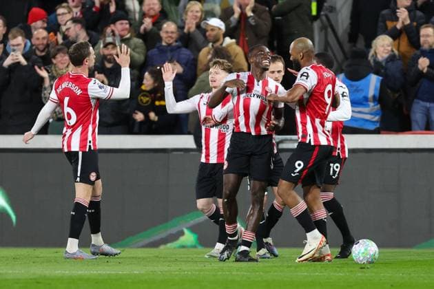 Michael Kayode of Brentford celebrates scoring his team s first goal of the match with his teammates Brentford v Wolverhampton Wanderers, Football, Premier League, The Gtech Community Stadium, London, UK - 16 03 2026 EDITORIAL USE ONLY No use with unauthorised audio, video, data, fixture lists (outside the EU), club league logos or live services. Online in-match use limited to 45 images (+15 in extra time). No use to emulate moving images. No use in betting, games or Copyright: xAnthonyxHanc Shutterstockx 16777223e