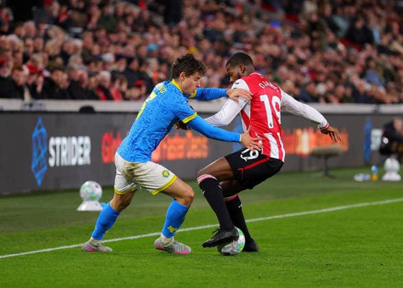 16th March 2026; Gtech Community Stadium, Brentford, London, England; Premier League Football, Brentford versus Wolverhampton Wanderers; Hugo Bueno of Wolverhampton Wanderers under pressure from Dango Ouattara of Brentford  JPxFletcher Content restricted for UK based newspaper