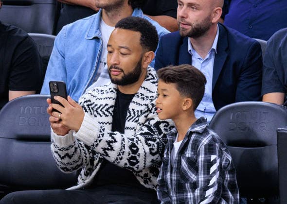 March 16, 2026, Inglewood, California, USA: John Legend and son, Miles Theodore attend the 2026 NBA, Basketball Herren, USA regular season game between the LA Clippers and the San Antonio Spurs on Monday March 16, 2026 at Intuit Dome Arena in Inglewood, California. JAVIER ROJAS PI Celebrities At Clippers Vs. Spurs Game  - ZUMAp124 20260316_zaa_p124_107 Copyright: xJavierxRojasx