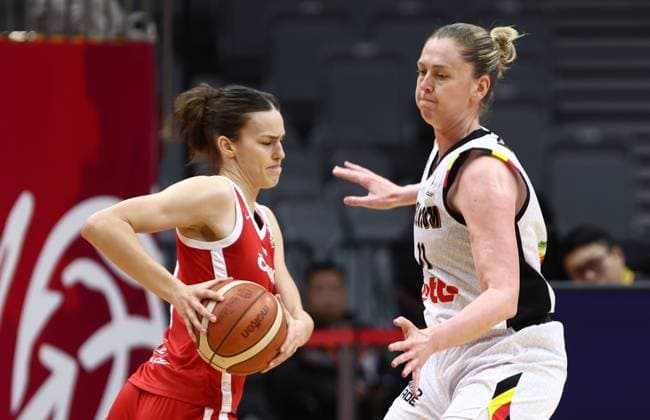 Czech Veronika Vorackova and Belgium s Emma Meesseman fight for the ball during a basket game between Belgium s national team, Nationalteam Belgian Cats and Czech Republic, in Wuhan, China, on Tuesday 17 March 2026, the fifth game (out of 5) of the qualifications phase for the World Cup Basket tournament. NIKOLAxKRSTIC  x167814907x