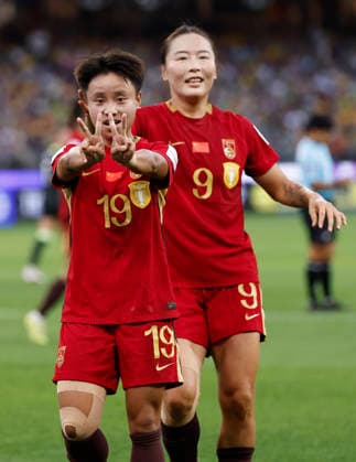 (260317) -- PERTH, March 17, 2026 -- Zhang Linyan (L) of China celebrates after scoring a penalty during the semifinal of Women s Asian Cup between China and Australia at Perth Stadium in Perth, Australia, March 17, 2026. ) (SP)AUSTRALIA-PERTH-FOOTBALL-WOMEN S ASIAN CUP-SEMIFINAL-CHN VS AUS MaxPing 