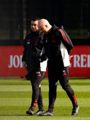 17th March 2026; AXA Training Centre, Liverpool, Merseyside, England; UEFA Champions League Football; Liverpool versus Galatasaray; Open Training; Liverpool manager Arne Slot with assistant coach Giovanni van Bronckhorst  AlanxMartin Content restricted for UK based newspaper