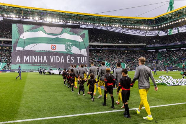 260317 Players of Bodo Glimt enters the pitch ahead of the UEFA Champions League football match between Sporting CP and Bodo Glimt on March 17, 2026 in Lisbon Photo Marius Simensen BILDBYRAN COP 238 MM0063 bbeng football fotball fotboll soccer uefa champions league mesterligaen bodo glimt sporting clube de portugal sporting lisboa sporting lisbon sporting cp  Copyright: MARIUSxSIMENSEN BB260317BB725
