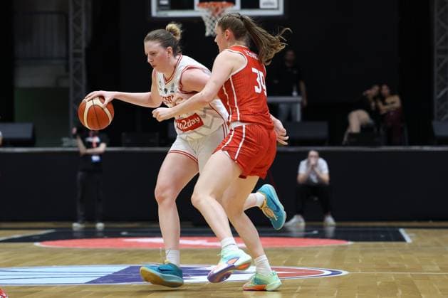 VIENNA, AUSTRIA, MAR. 17, 2026 WOMEN BASKETBALL EUROBASKET 2027 QUALIFIERS ·First Round · Group D, AUSTRIA vs SWITZERLAND Sarah Sagerer (AUT) and Lin Schwarz (SUI) in one-on-one one-on-one, basketball duel, attacking play, defensive play, dribbling, drive to the basket, player action, match moment, Motion, Challenging VIENNA VIENNA, Hallmann Dome Hallmann Dome, Austria (AUT) AUSTRIA