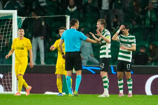 Football, Champions League 2025 2026 Sporting Lisbon Bodo Glimt Lisbon, Portugal 20260317 Referee Sandro Schärer and Sporting s Morten Hjulmand during the football match in the Champions League between Sporting Lisboa and Bodo Glimt at Estadio JosÃ Alvalade Photo Fredrik Varfjell NTB Lisboa Portugal EDITORIAL USE ONLY RESTRICTED USE FOR BETTING COMPANIES  Copyright: xFredrikxVarfjellx xNTBx